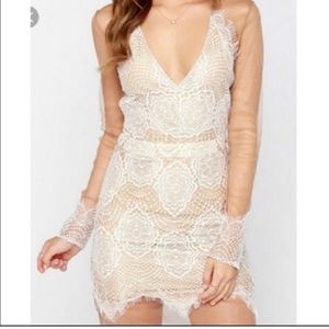 Luxxel white long sleeve lace trim dress.